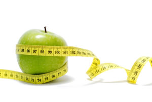 apple with measuring tape